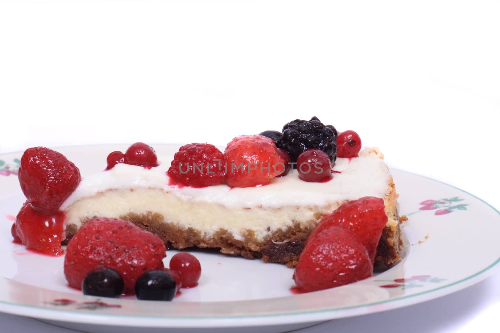 cheesecake with fruits on the white background 