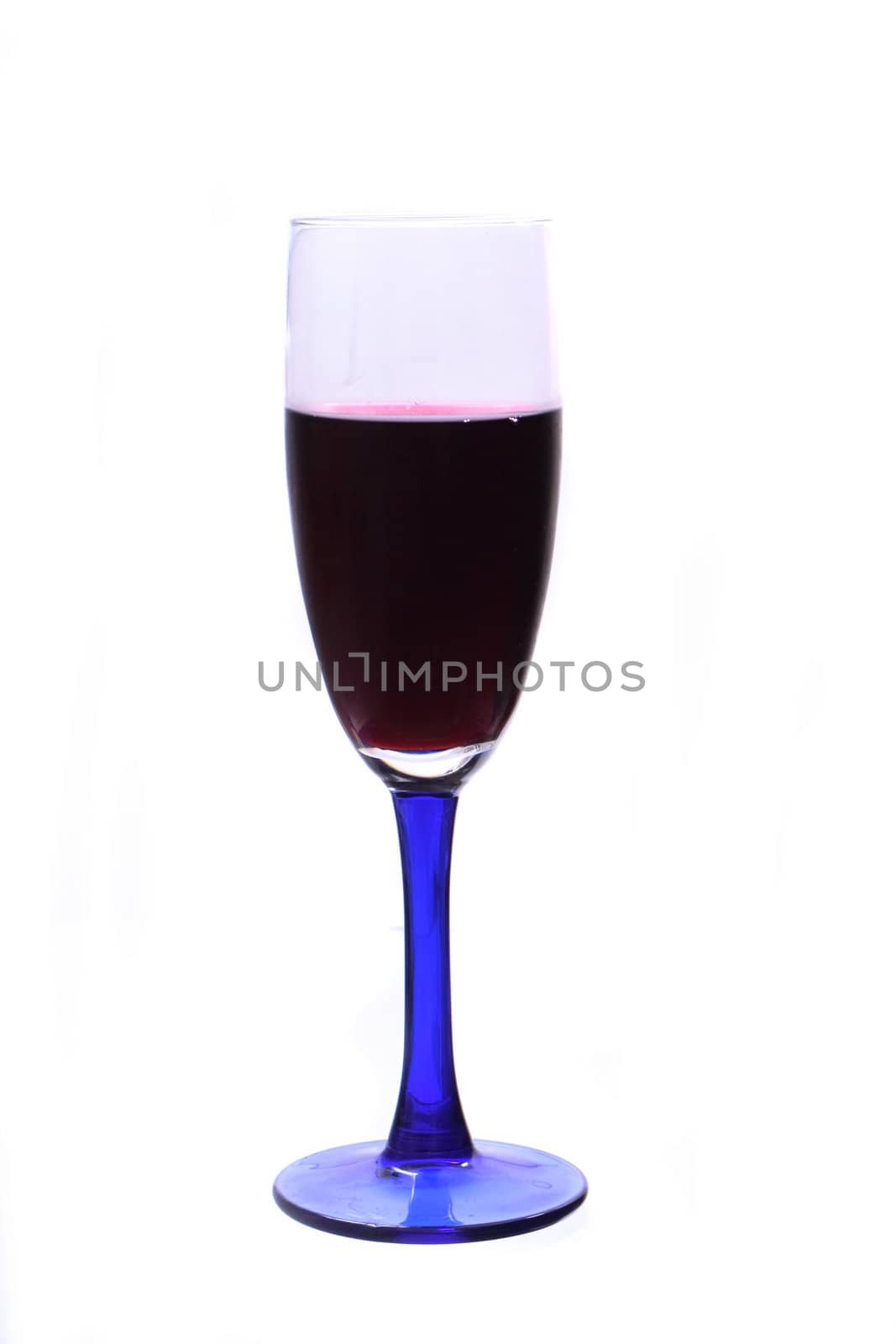 glass with red wine on the white background