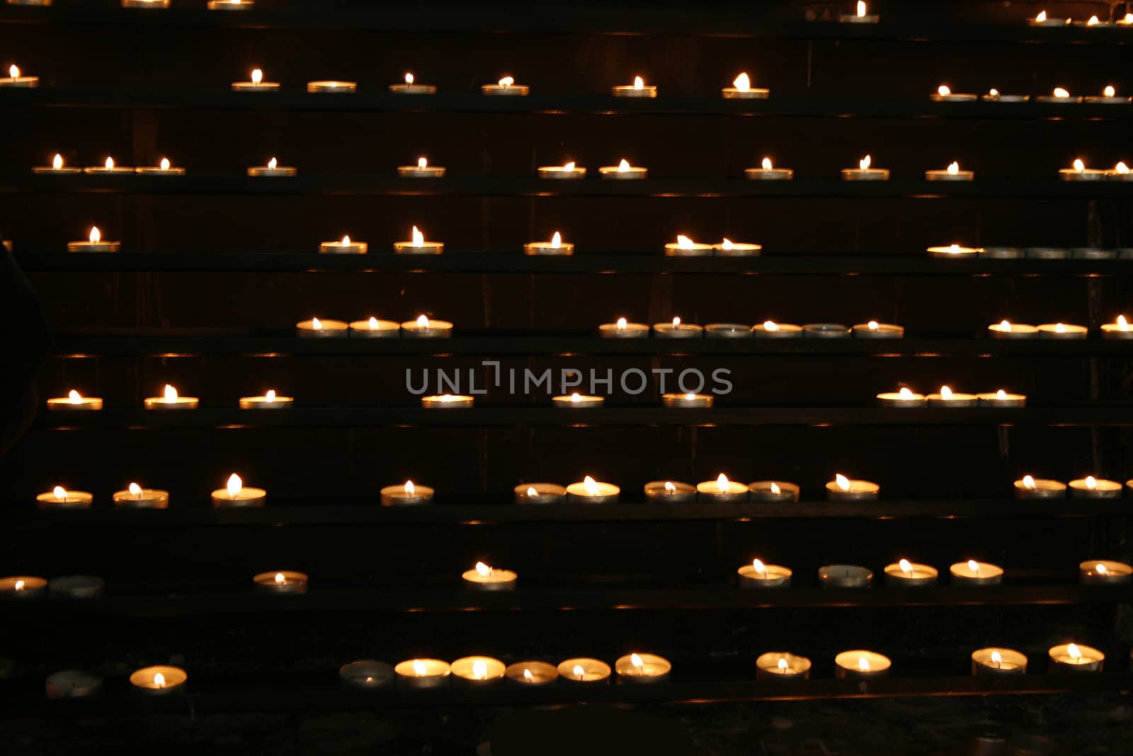 very romantic candles background in the church