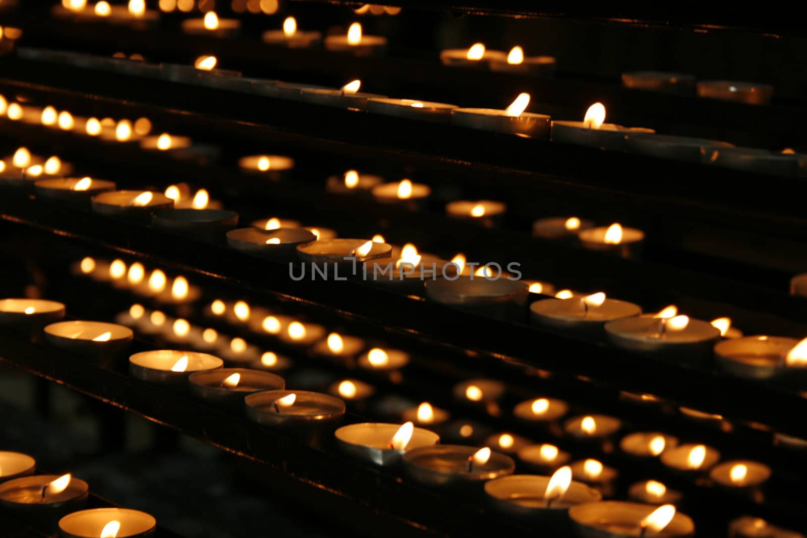 very romantic candles background in the church