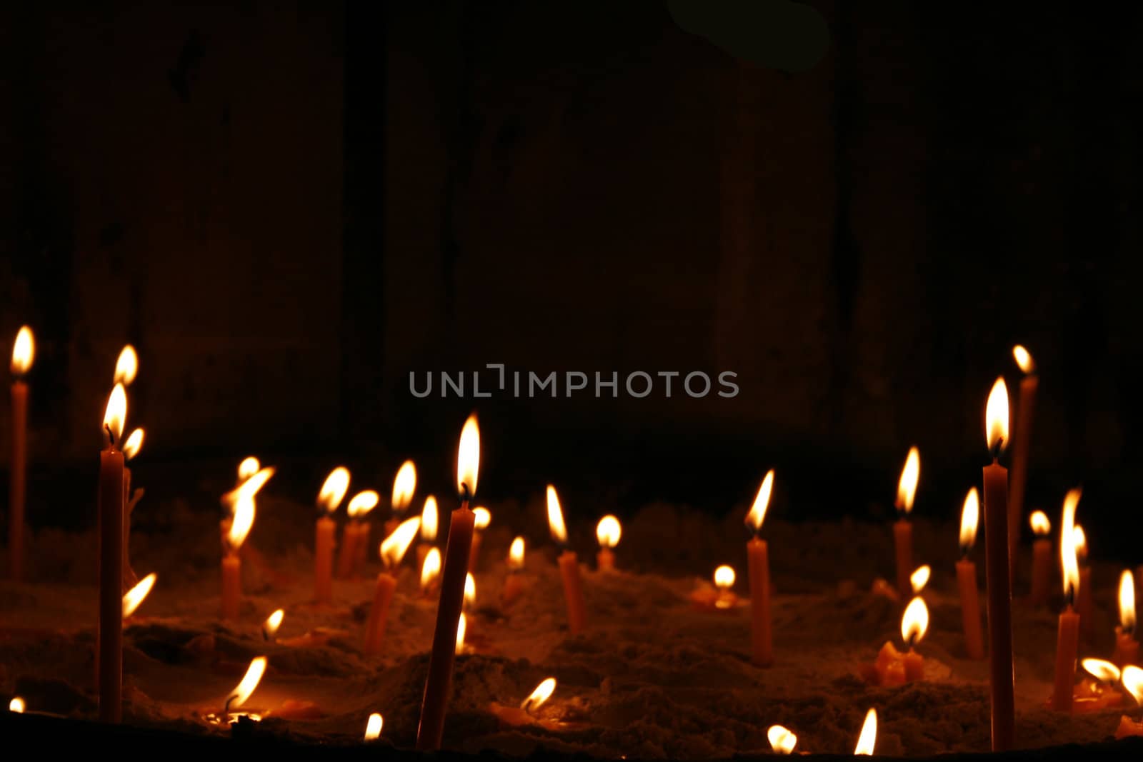 very romantic candles background in the church