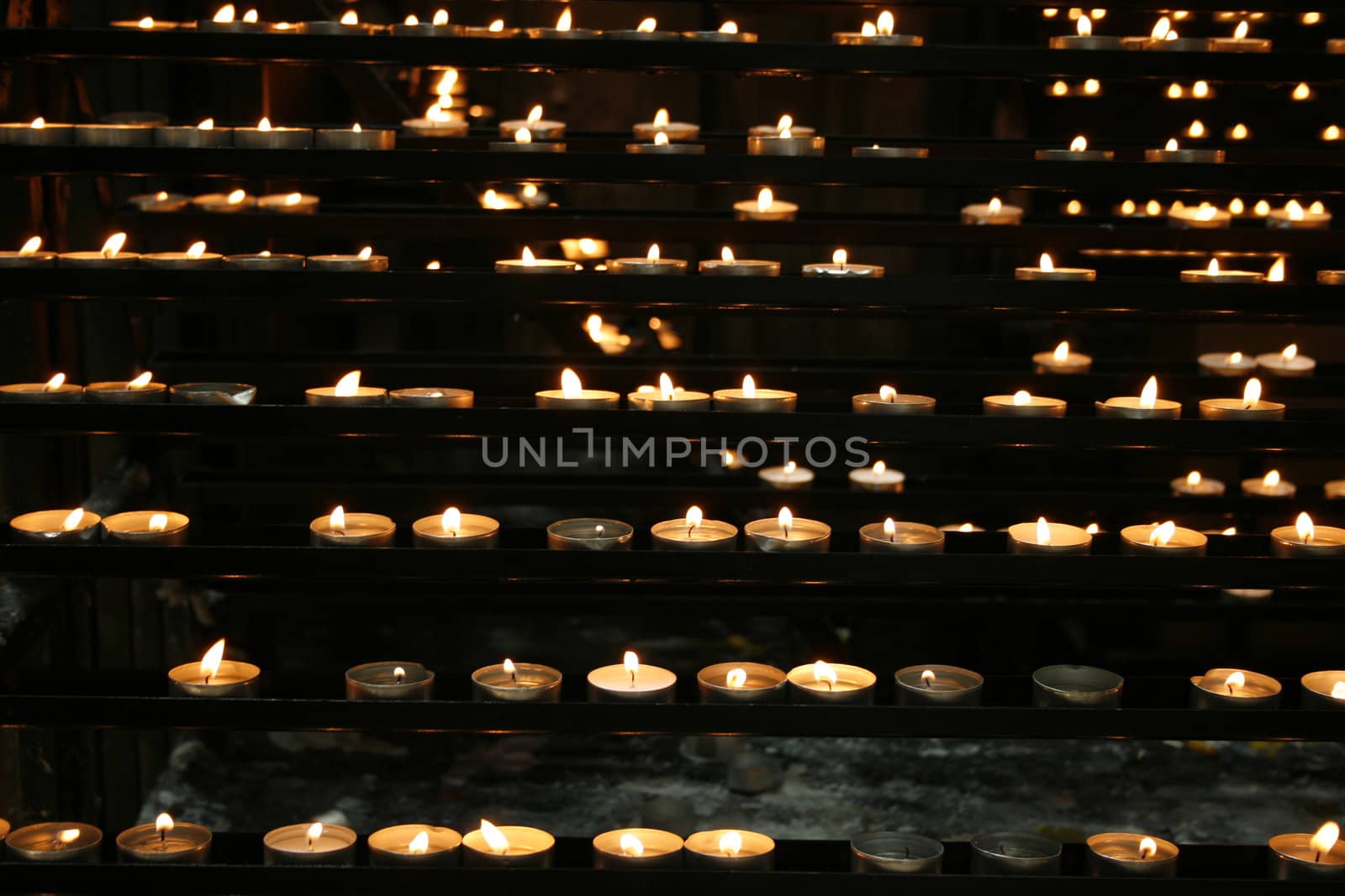 an abstract background from many little candles