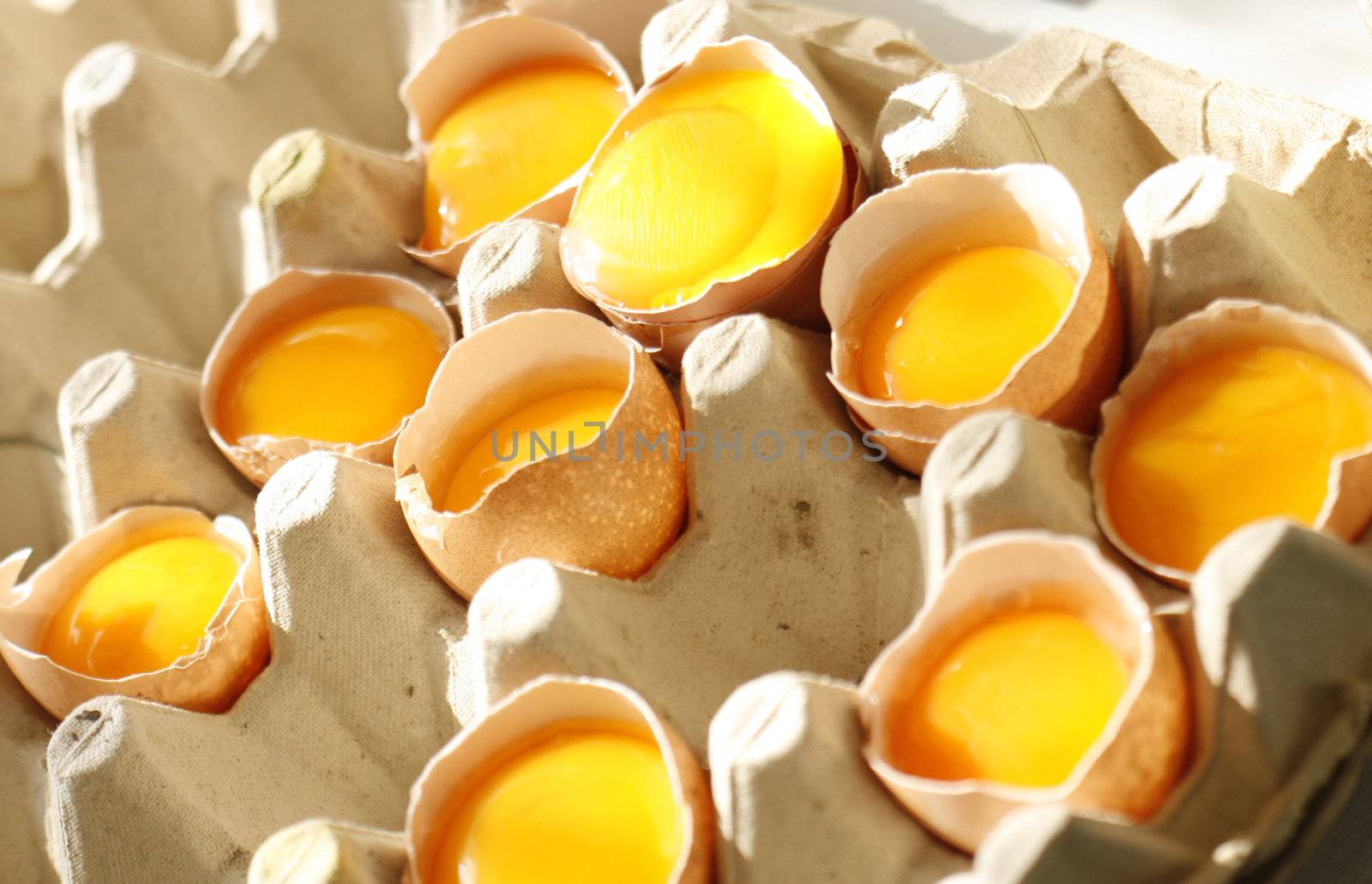 detail of open eggs (natural cooking background)