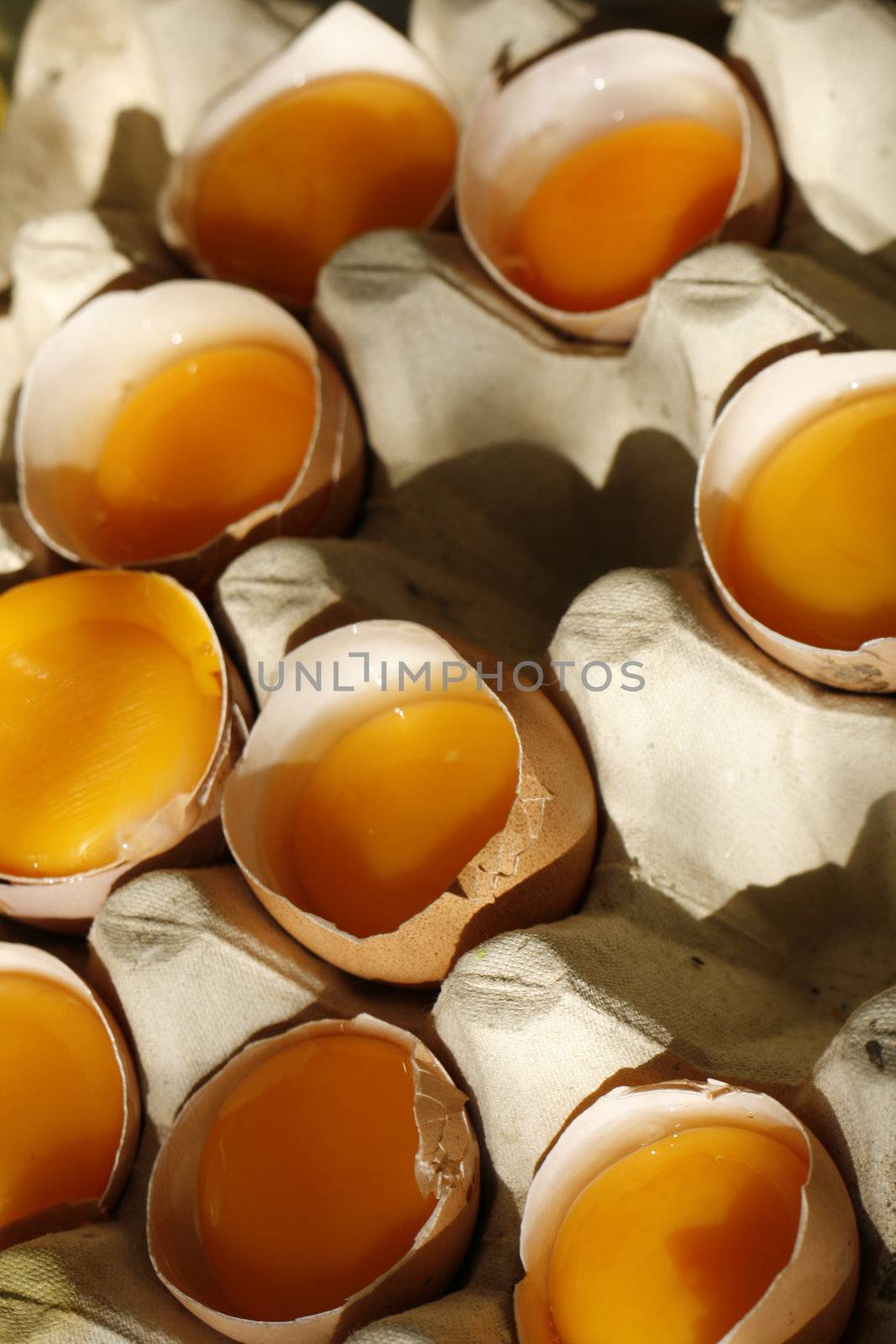 detail of open eggs (natural cooking background)