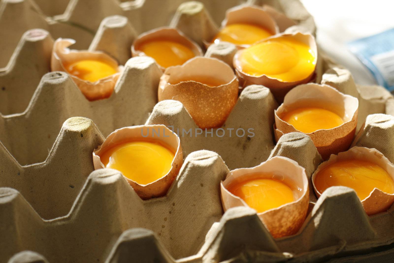 detail of open eggs (natural cooking background)
