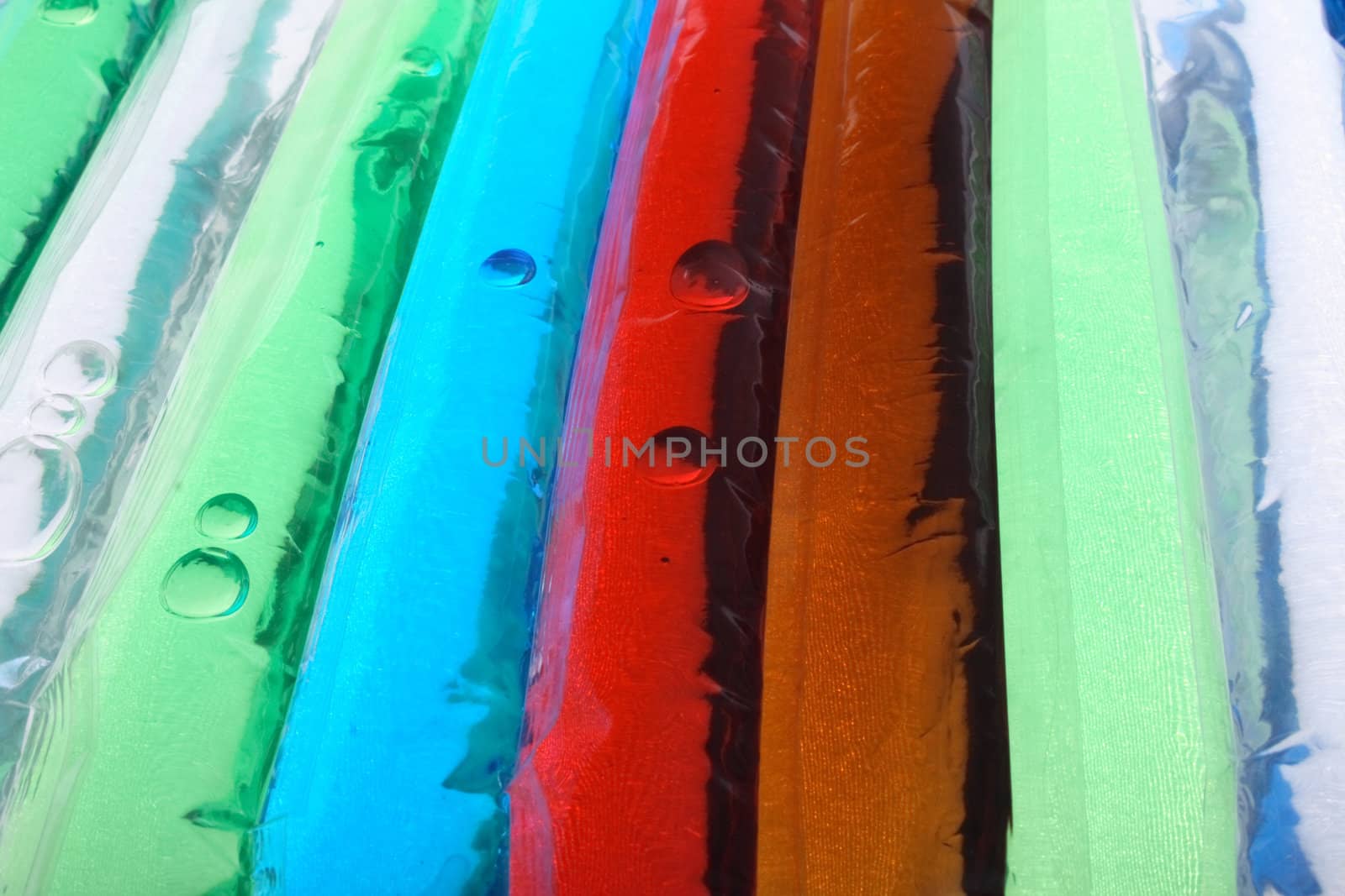 blue, red, brown and green liquid background 