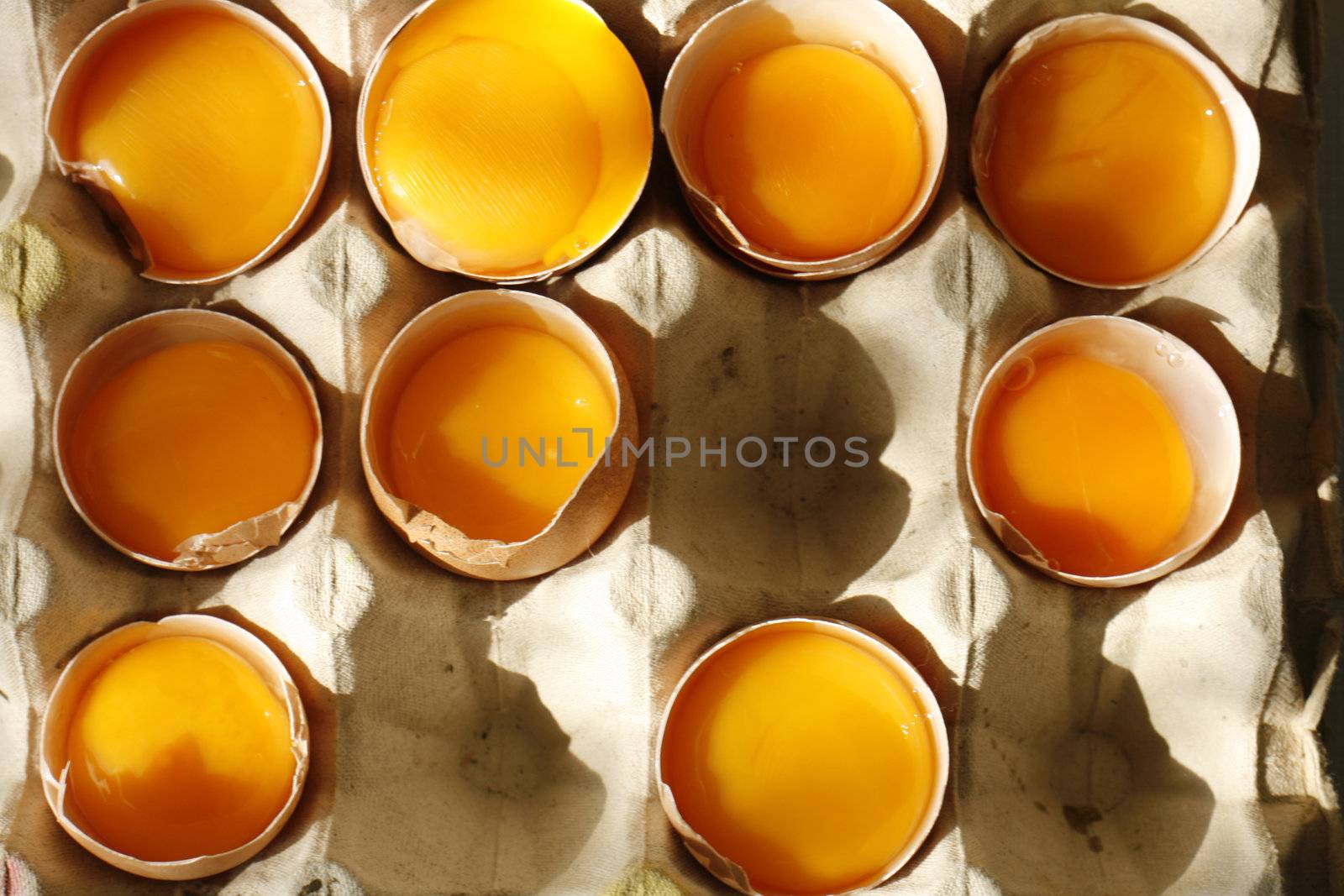 detail of open eggs (natural cooking background)