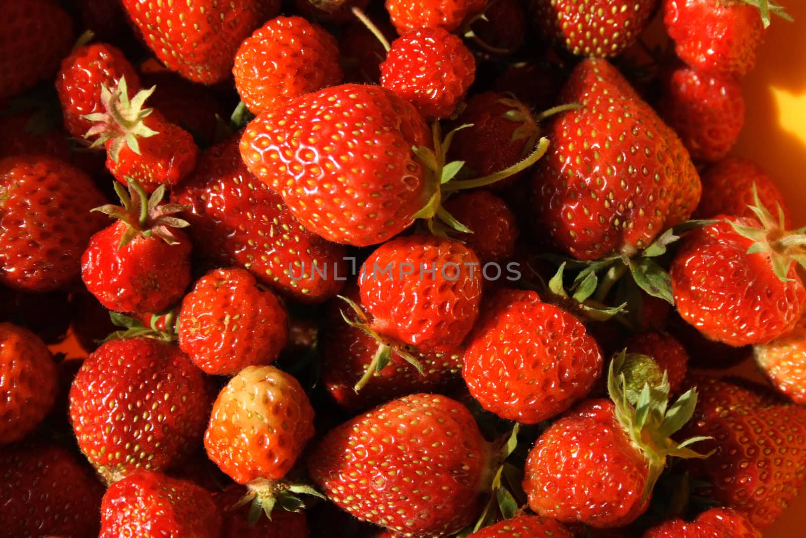 an abstract background from fresh strawberries