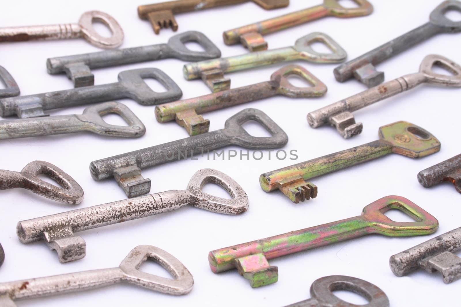 many old keys on the white background