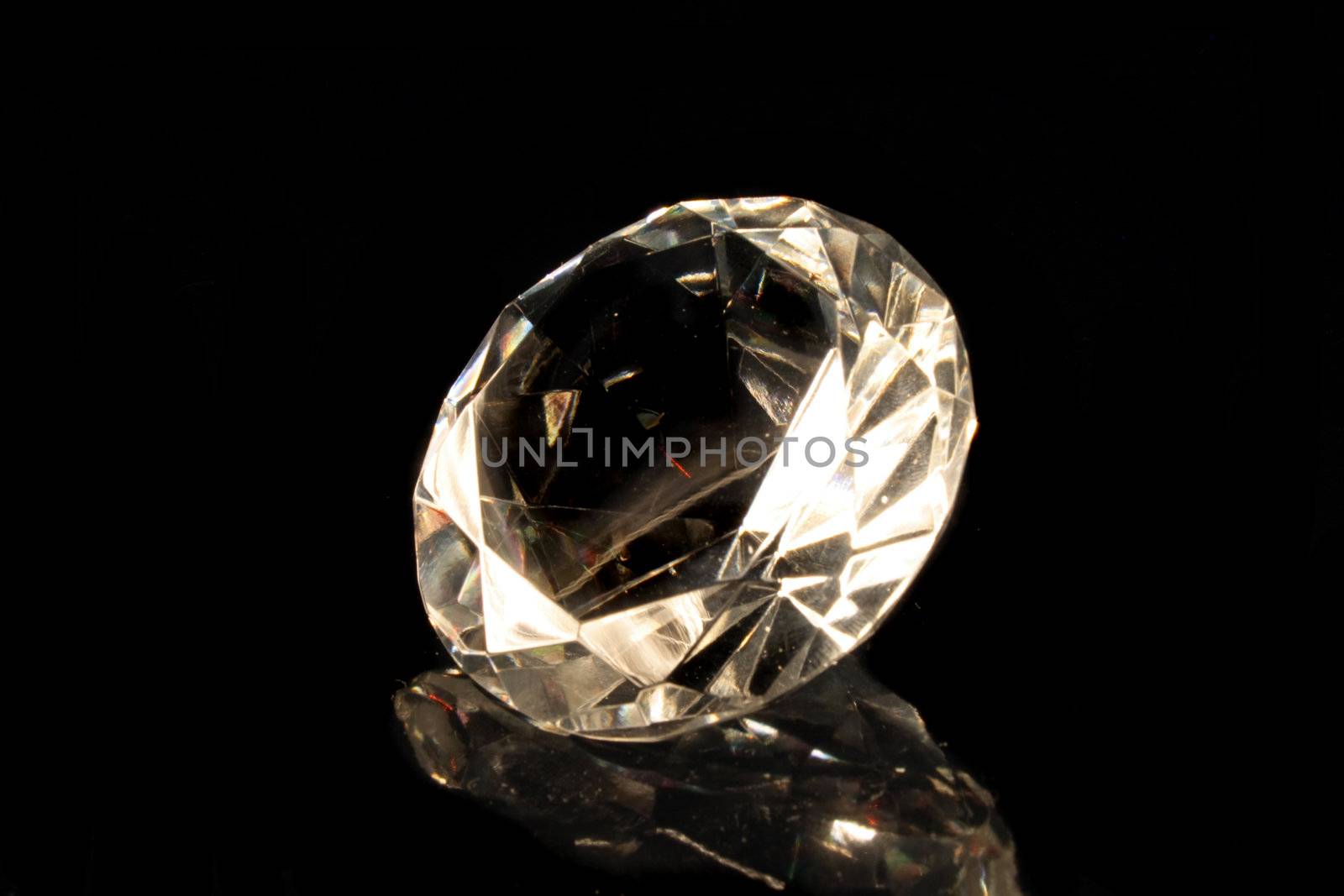 big shiny diamond on the black background 