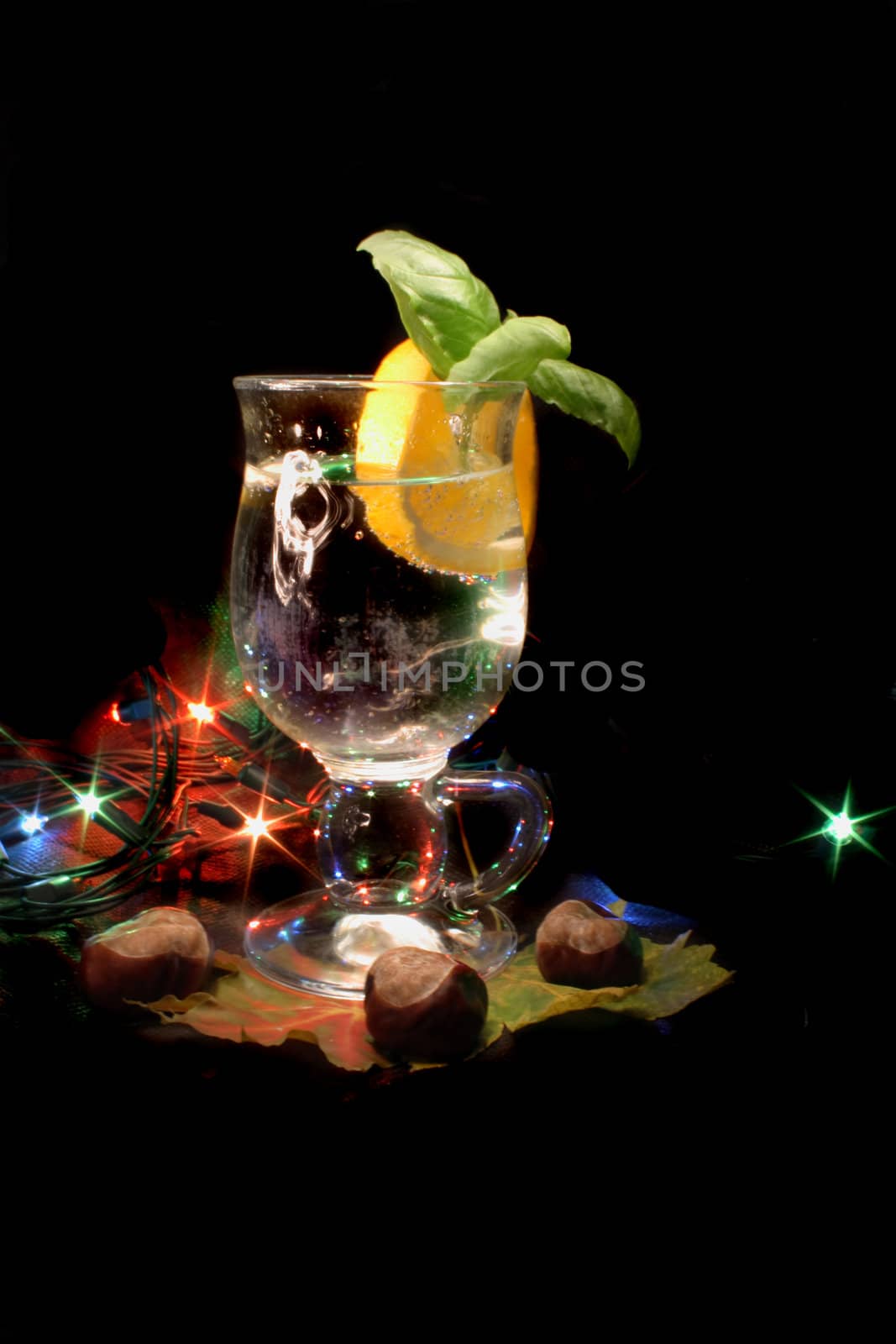 fresh drink with orange on the black background