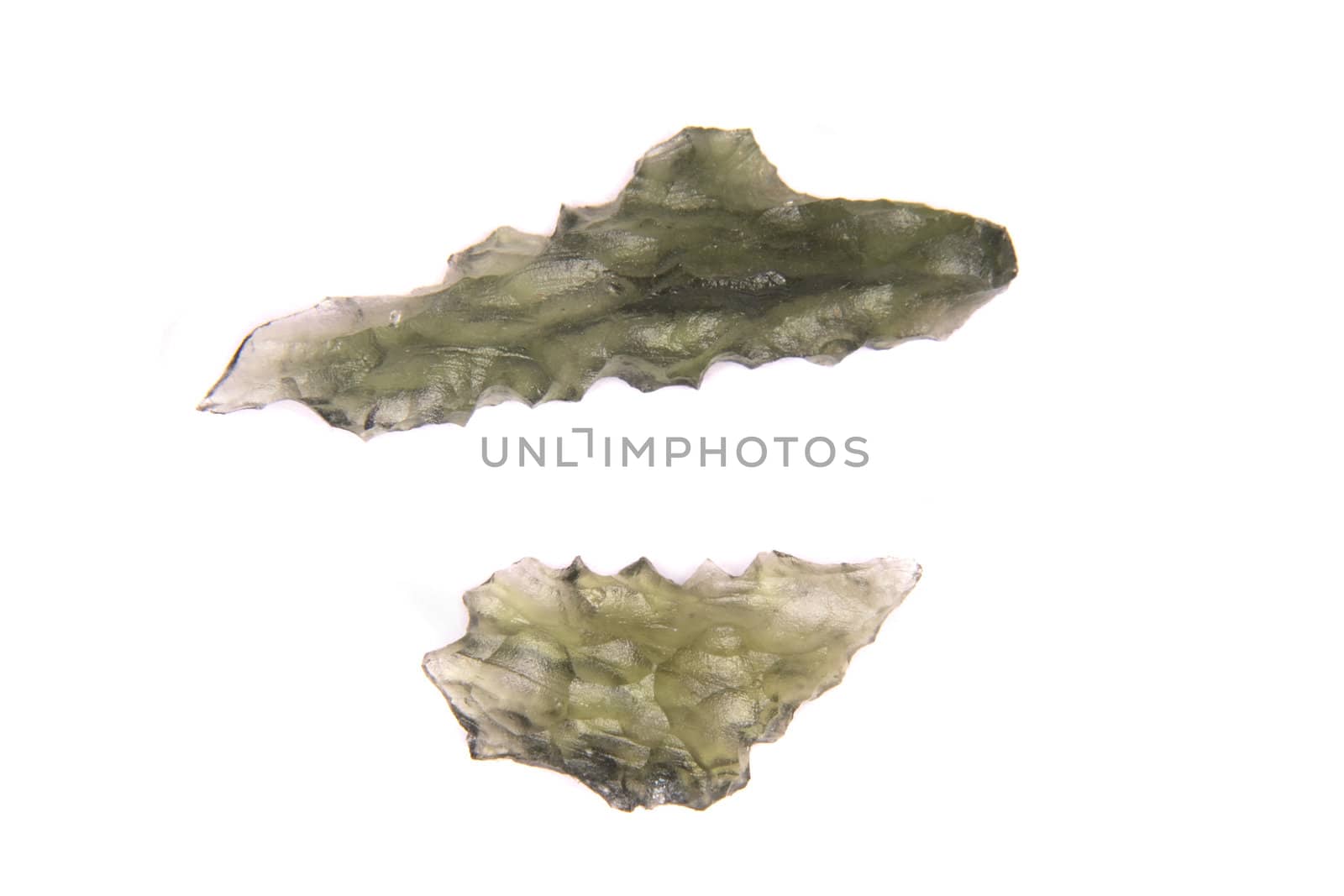 green czech gemstone on the white bakground