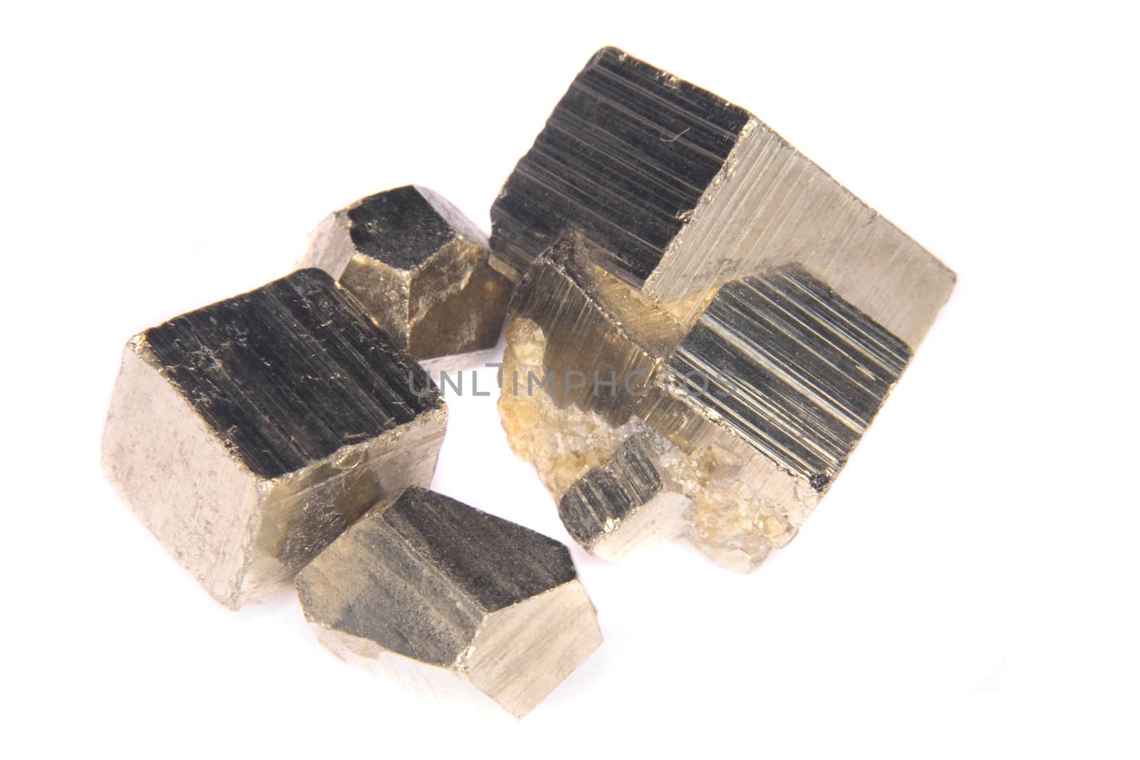 natural golden cubes on the white background 