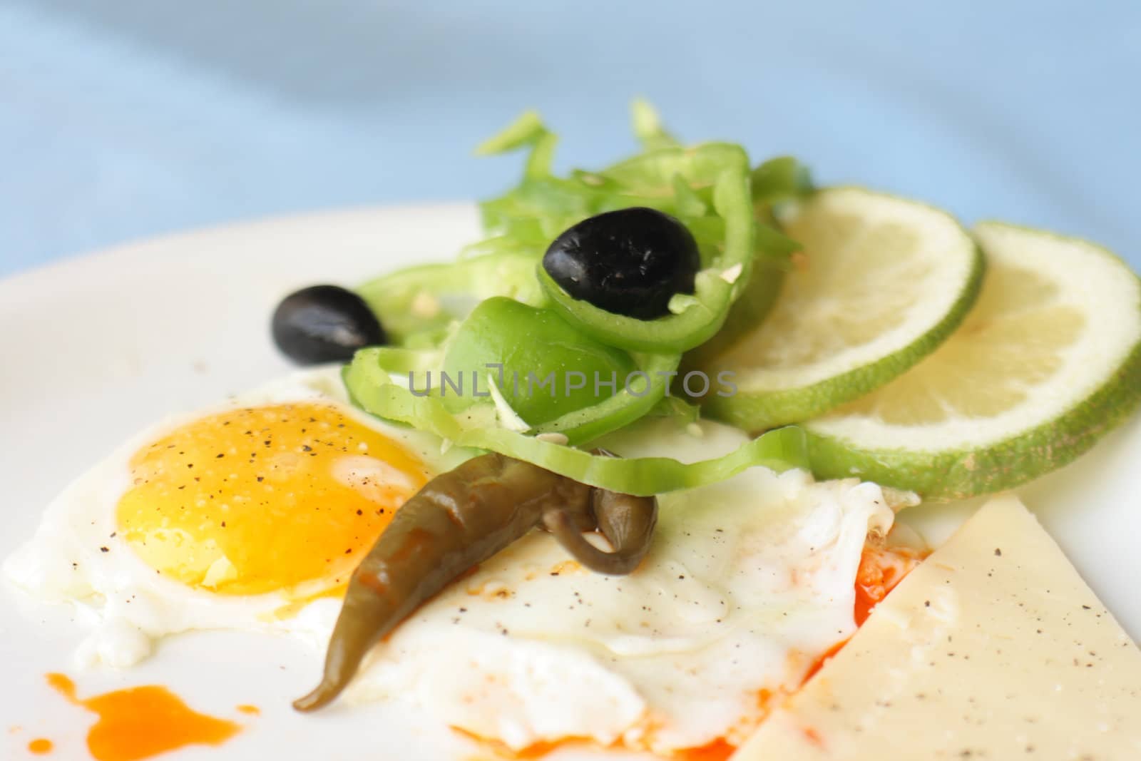 gourmet food with egg tomato and olives