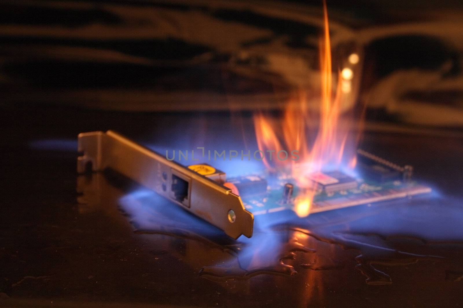 net card in the fire on the black background