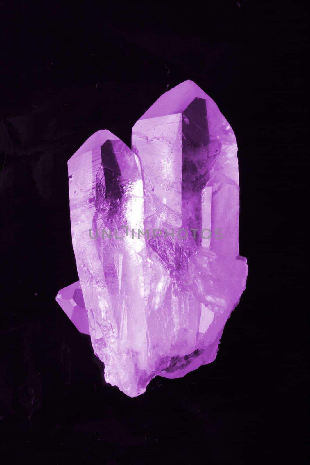 violet amethyst isolated on the black background