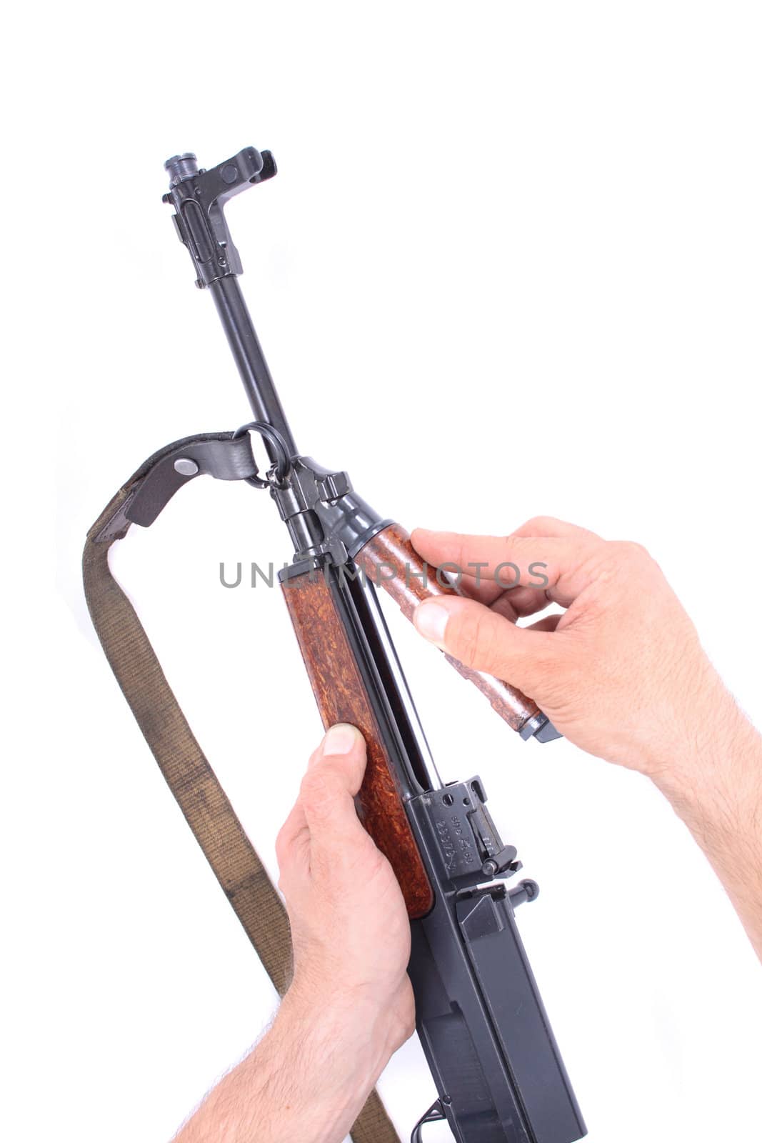 automatic gun and my hands isolated on the white background 