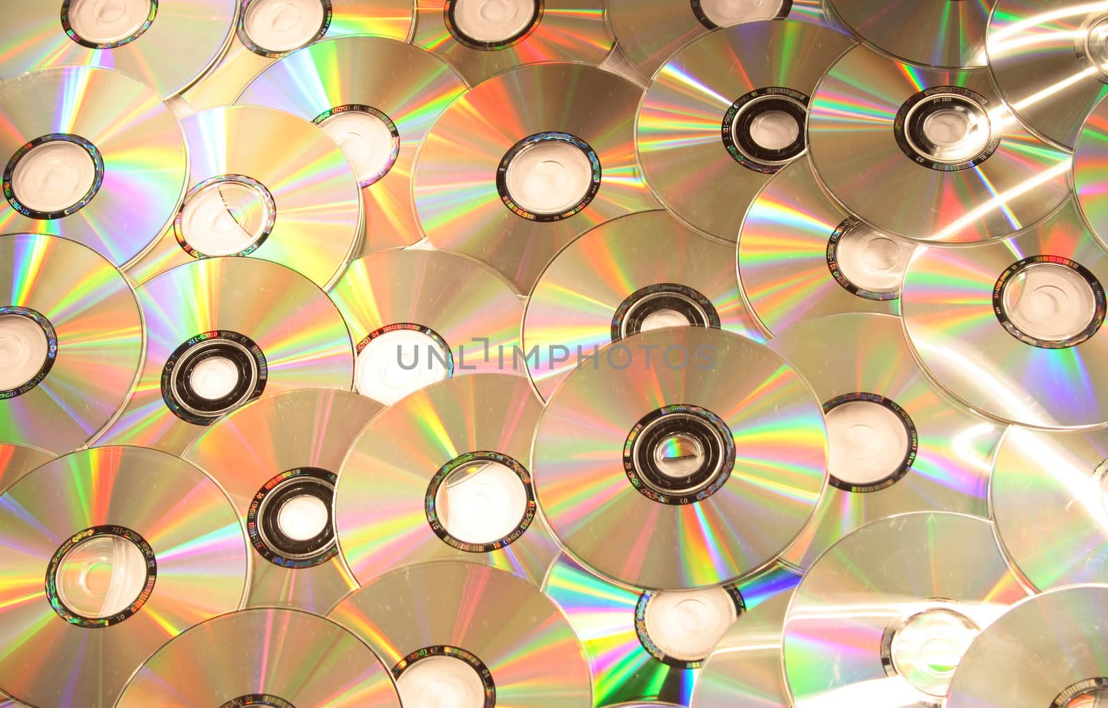 very much compact discs on the background