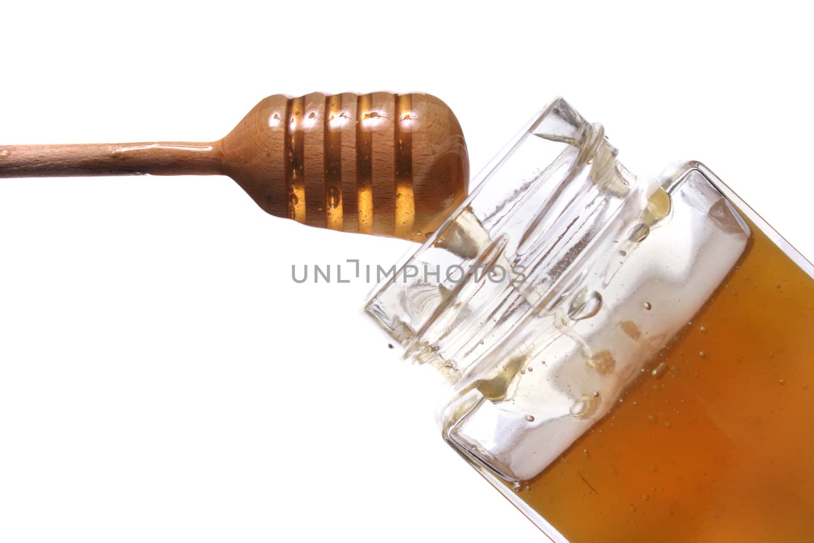 sweet honey isolated on the white background