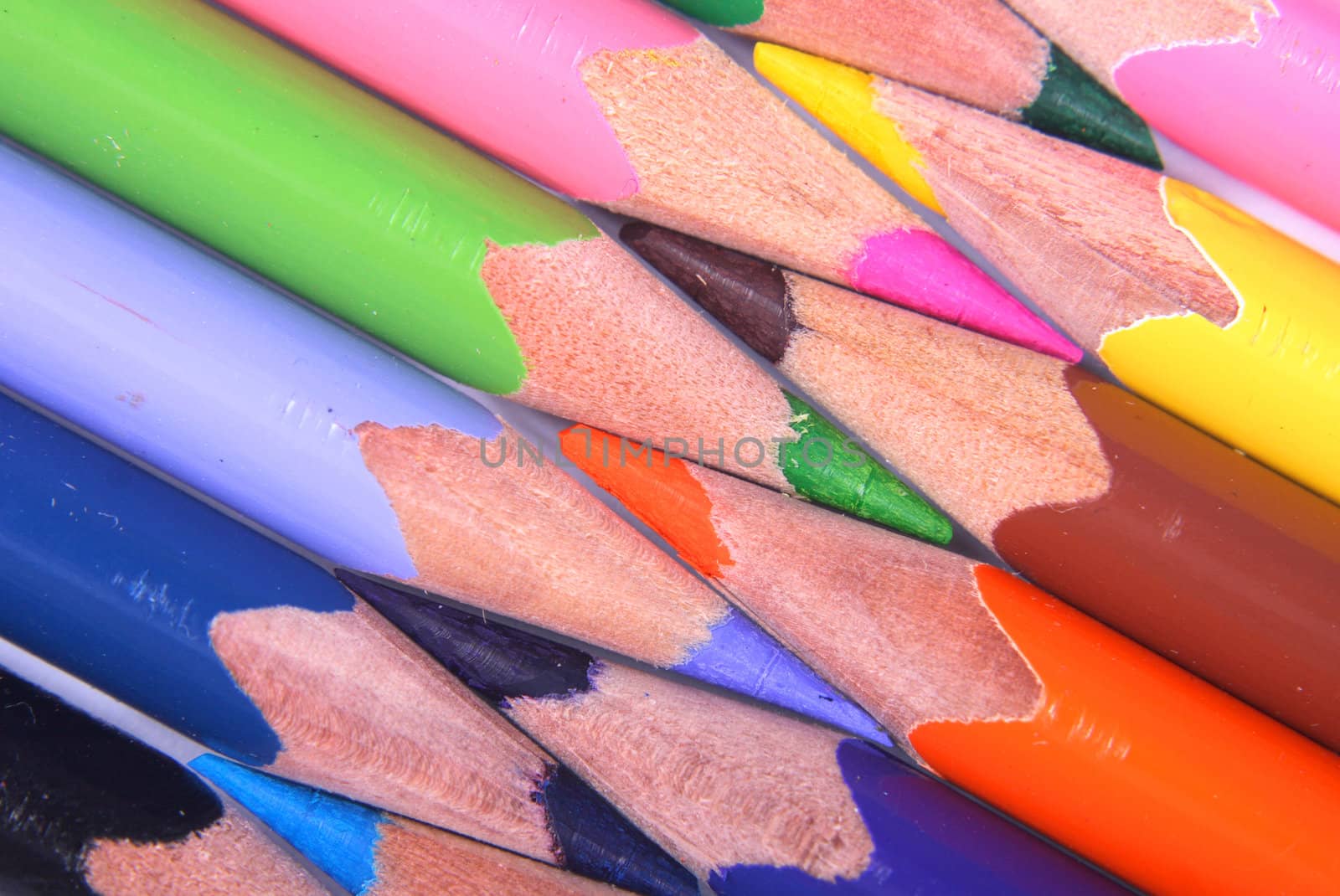 color crayons as art rainbow background
