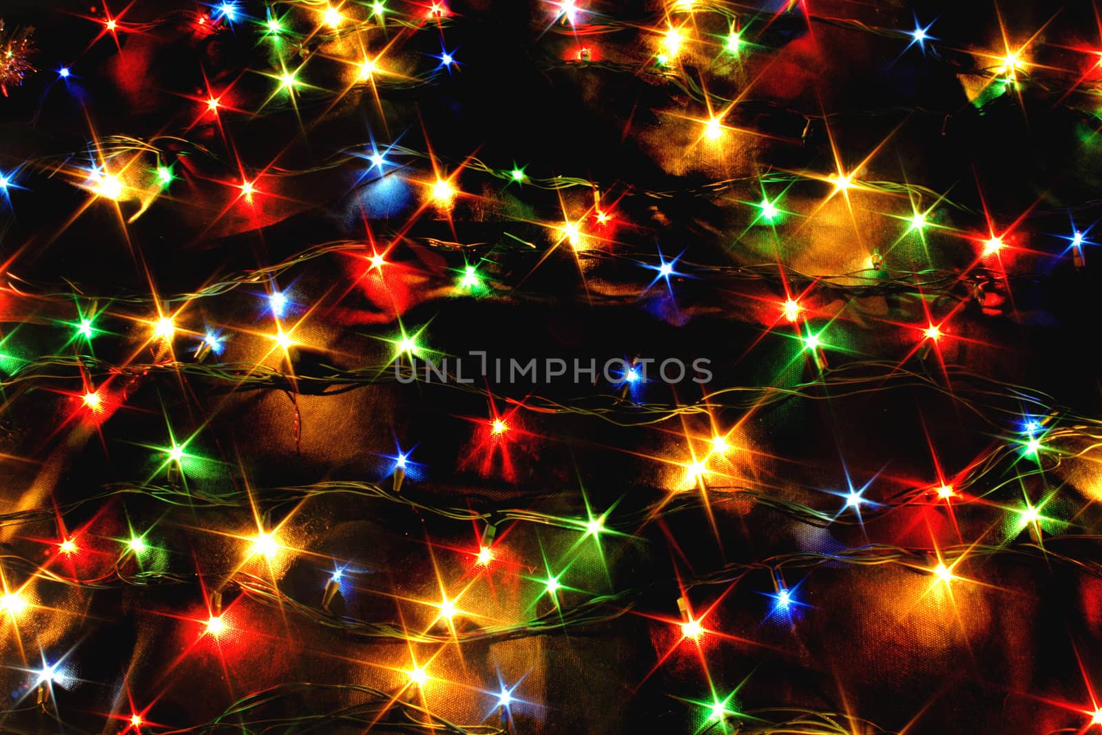 xmas background with color lights on the black background