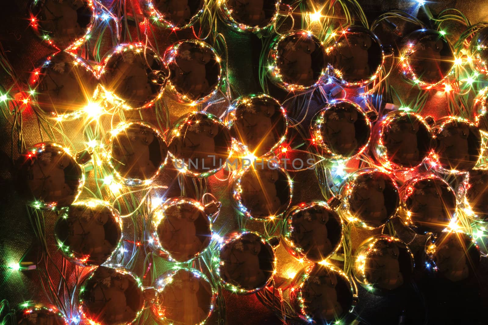 xmas background with color lights on the black background