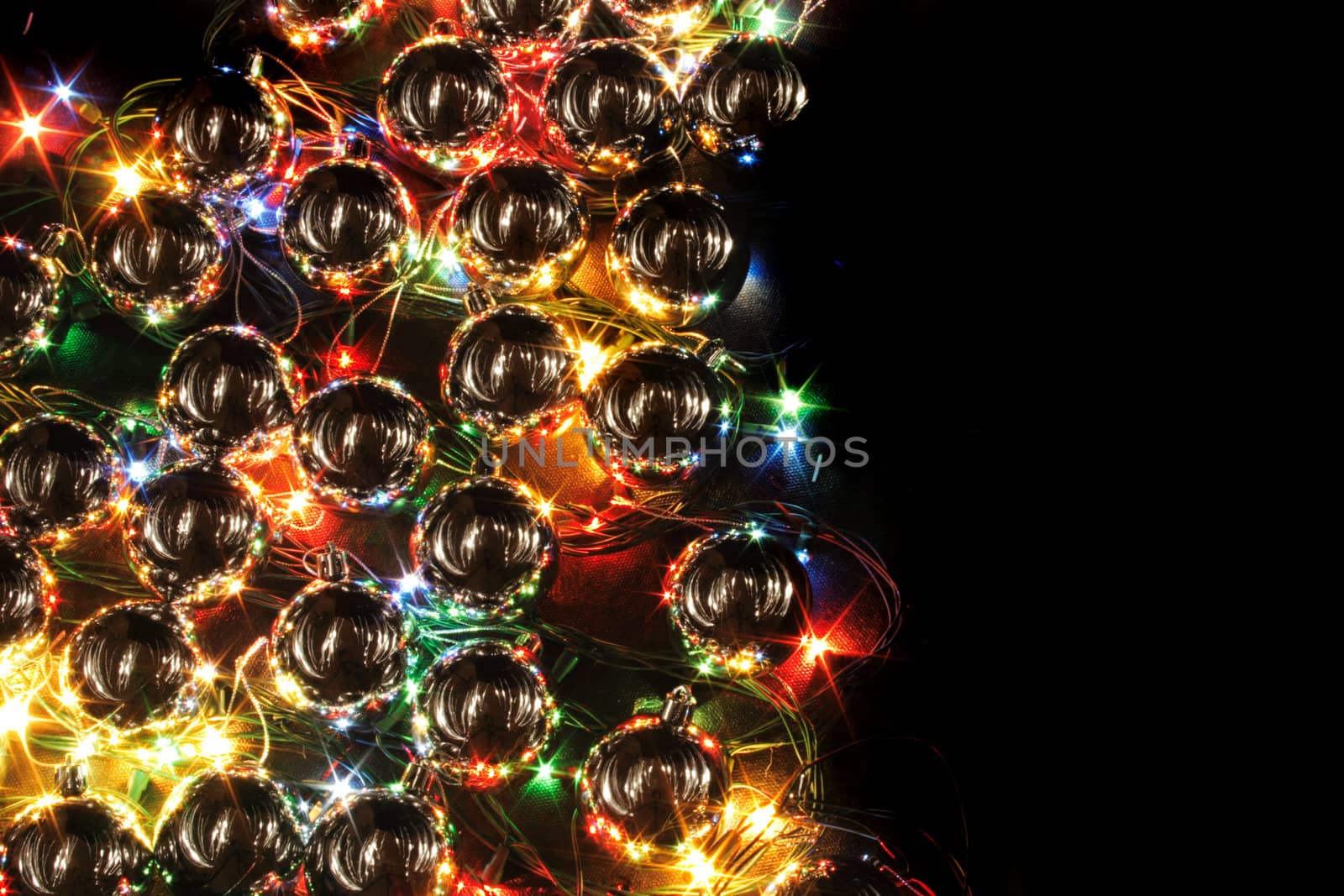 xmas background with color lights on the black background