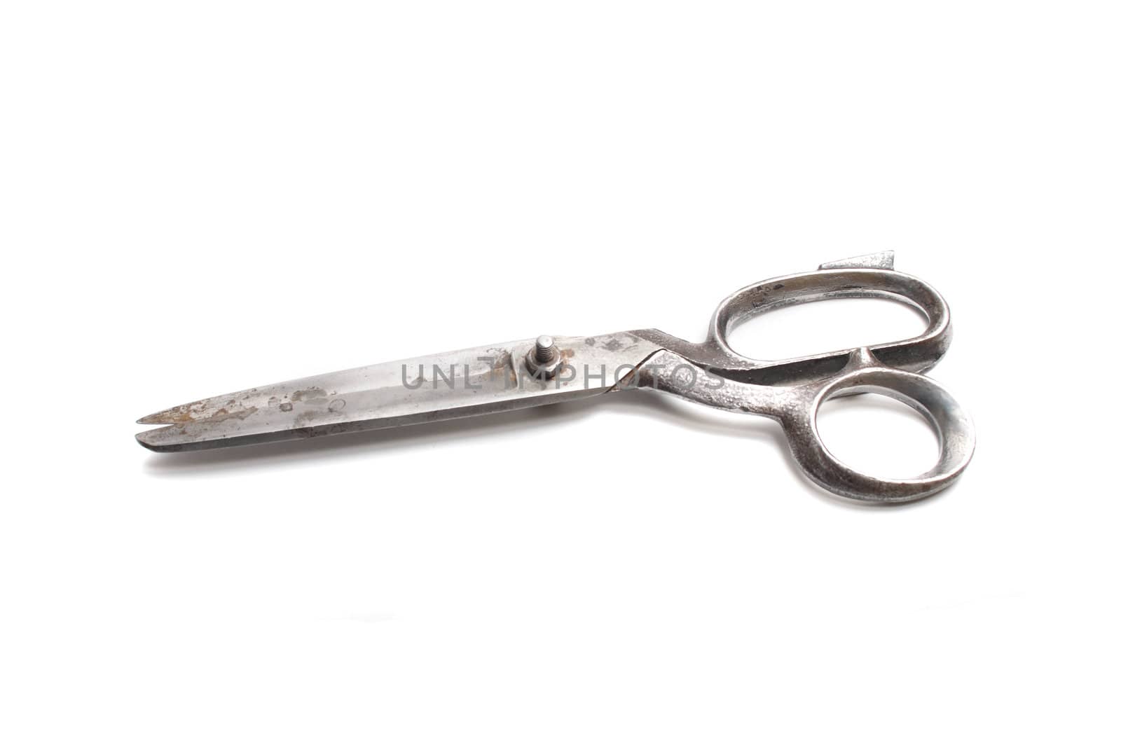 old scissors isolated on the white background