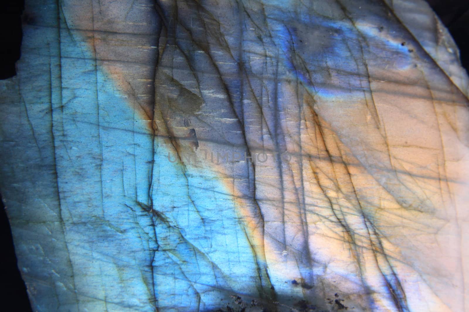 blue and gold  mineral background (detail of labradorite)
