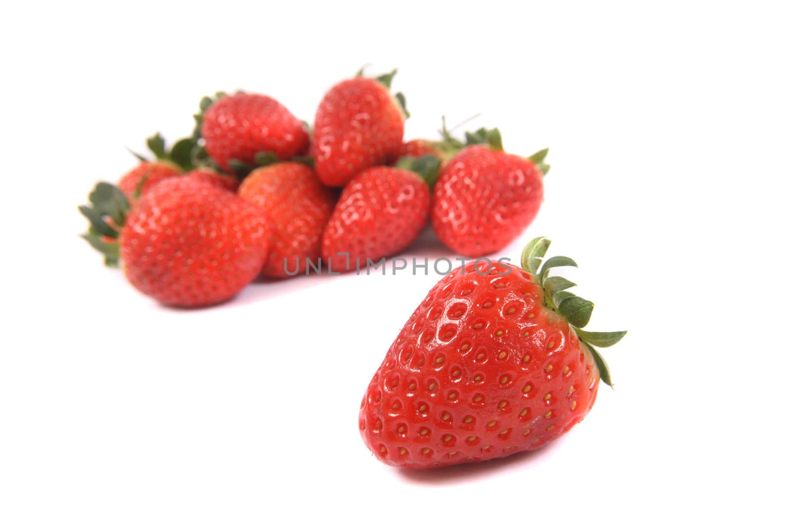 fresh red strawberries on the white background