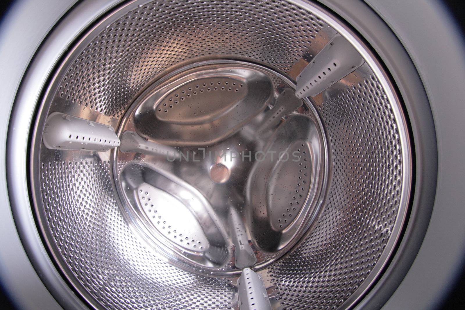 inside of empty and clear wash machine 