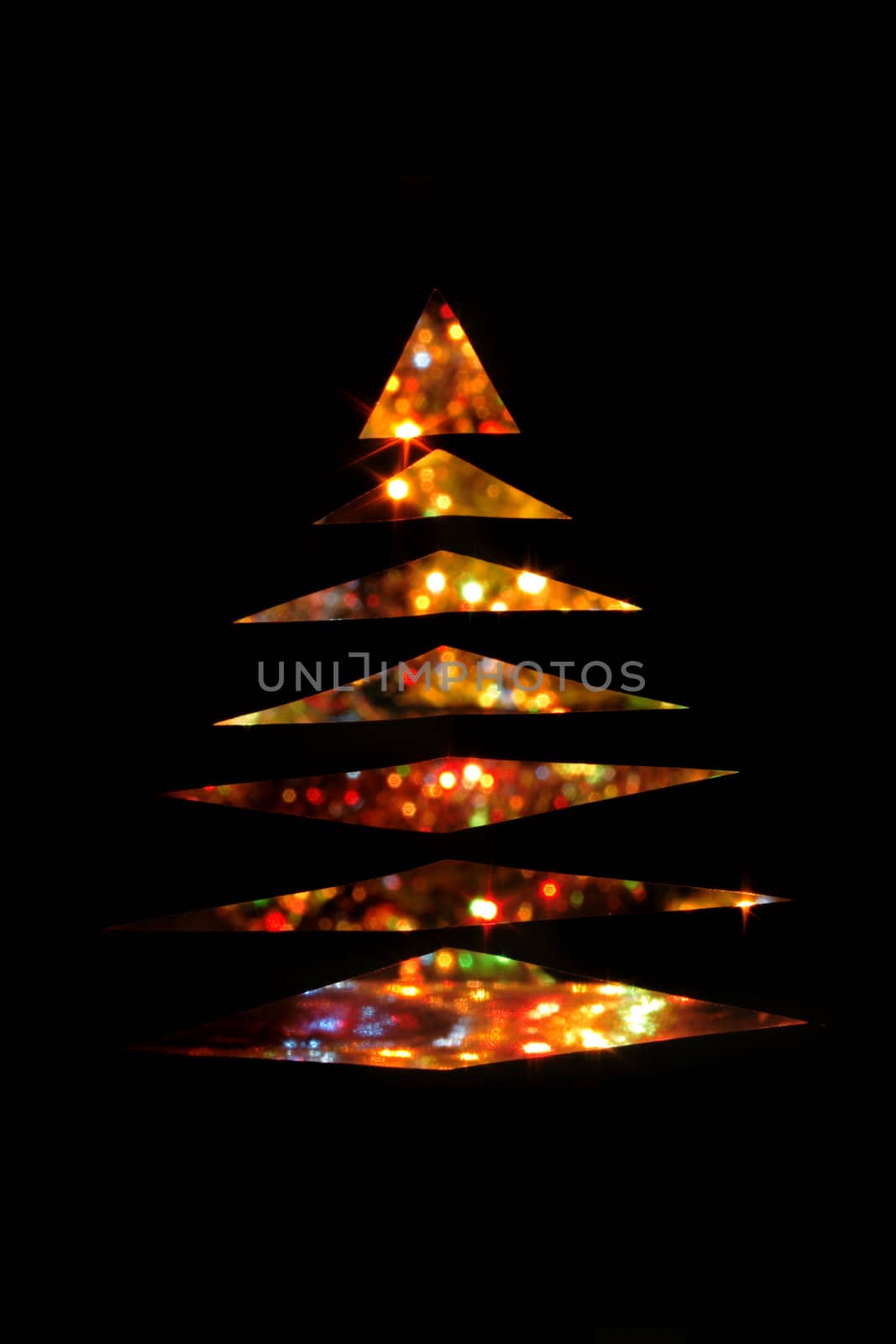 christmas tree from the color lights on the black background