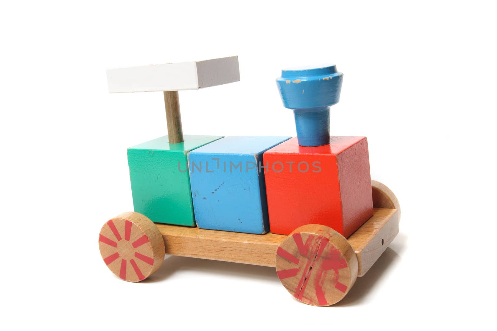 old wooden color toy on the white background