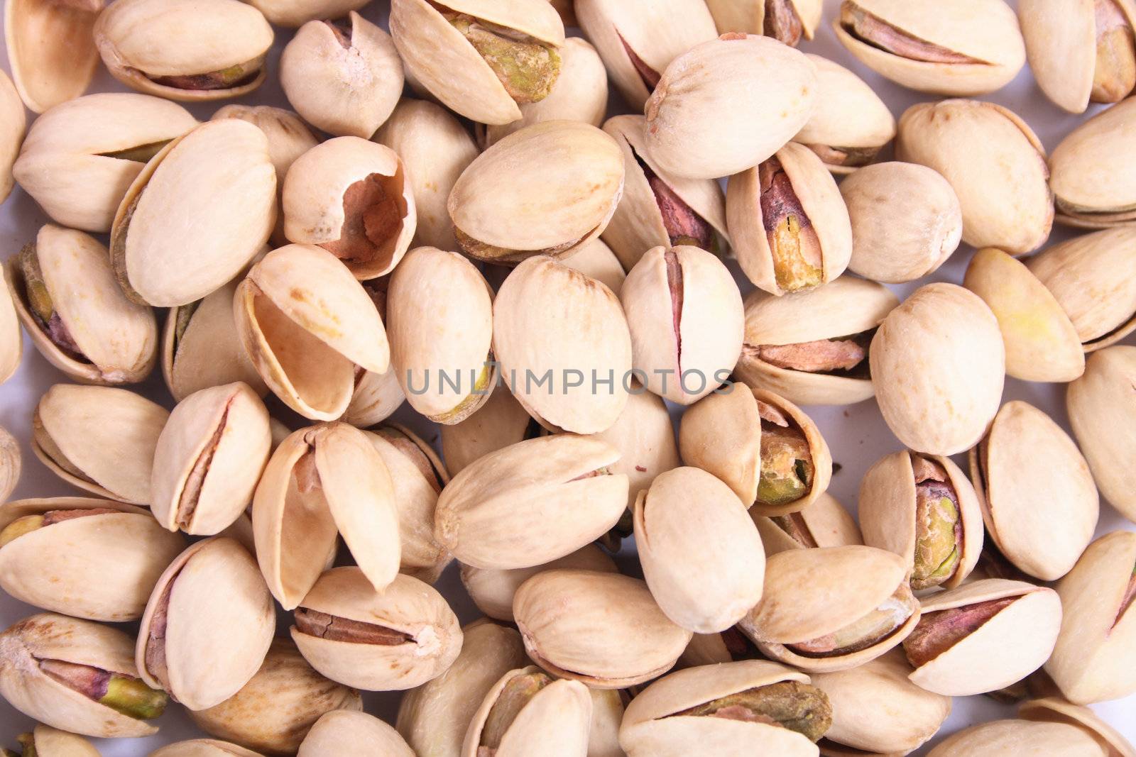 fresh salted pitachios as natural food background