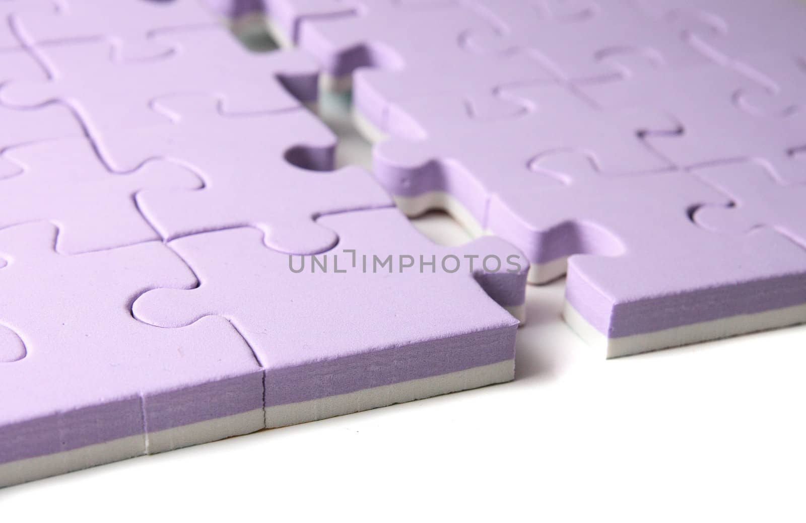 nice violet puzzle on the white background