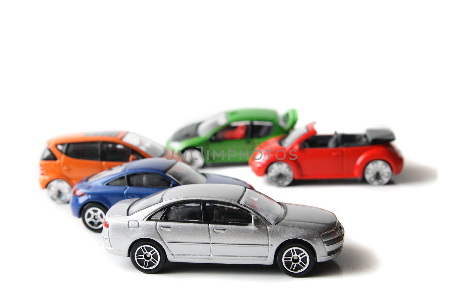 color metal toys on the white background 