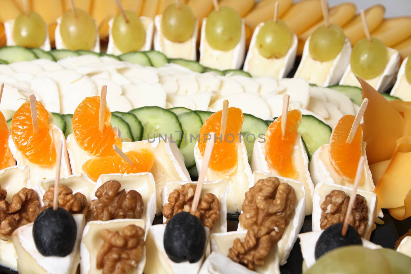 cheese snack with fruit and nuts from the party 