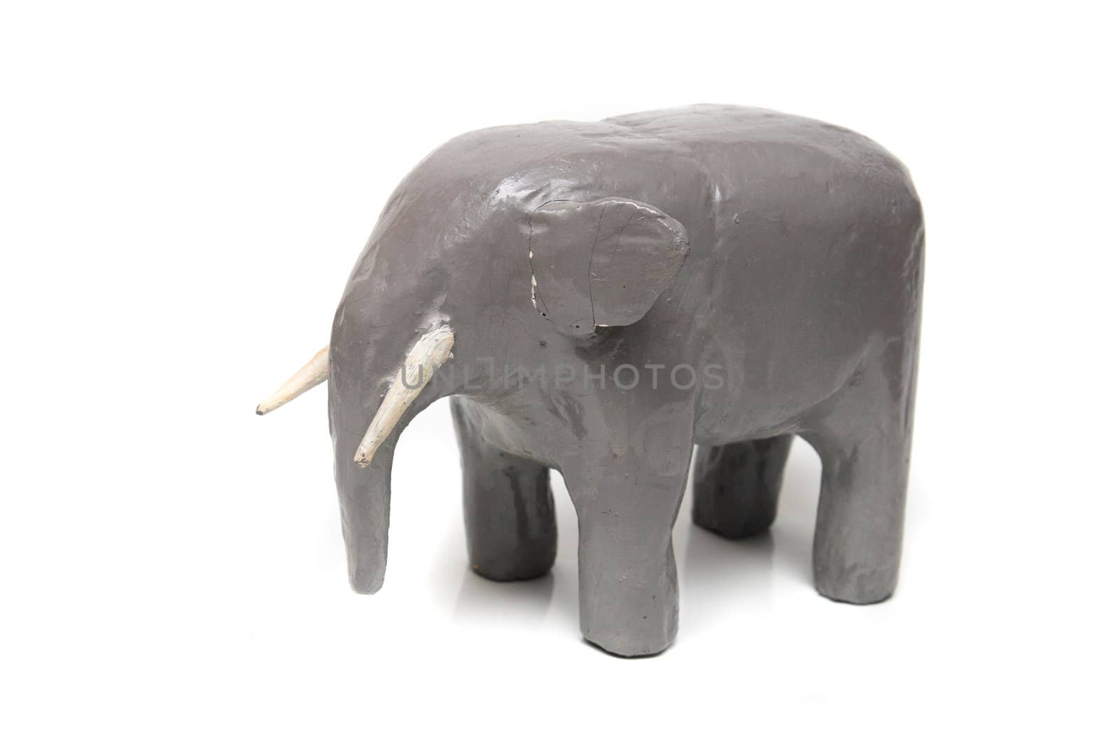 handmade wooden elephant on the white background