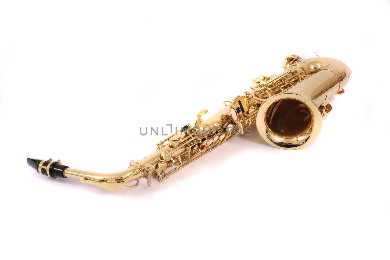 new gold saxophone on the white background