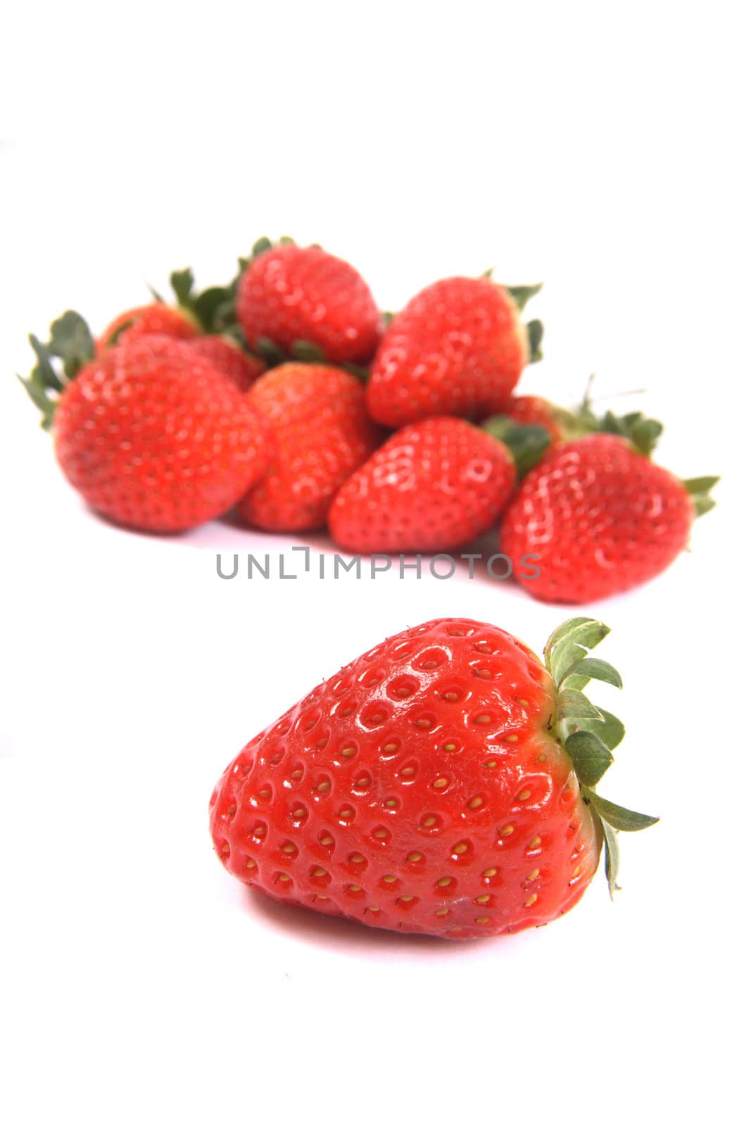 red strawberries isolated on the white background