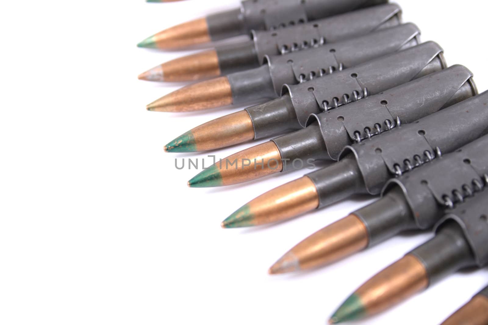 ammo from automatic gun isolated on the white background