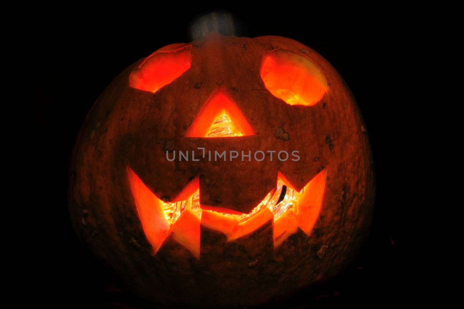 pumkin with ligths in dark halloween symbol