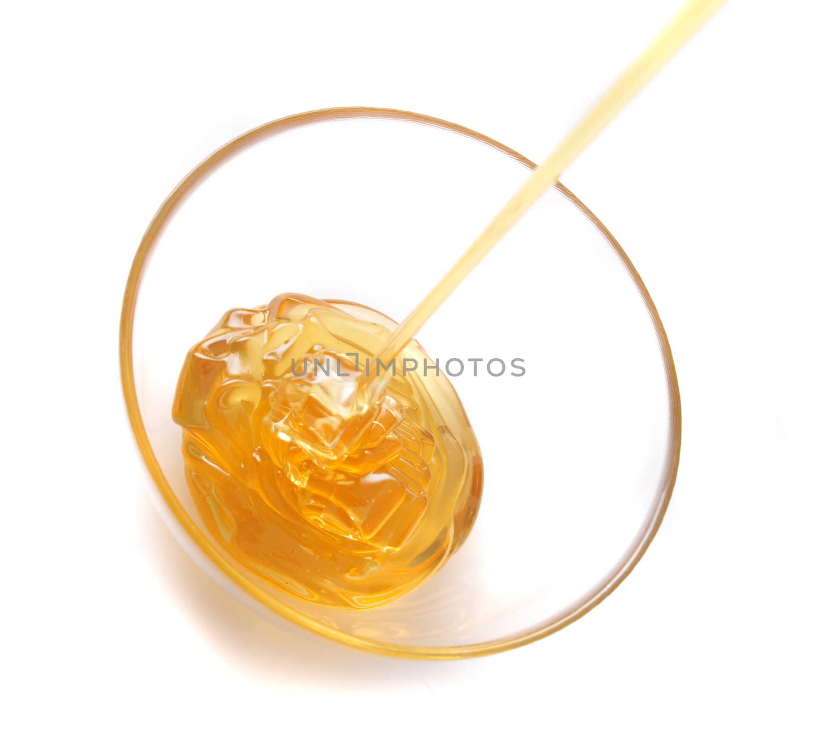fresh honey isolated on the white background
