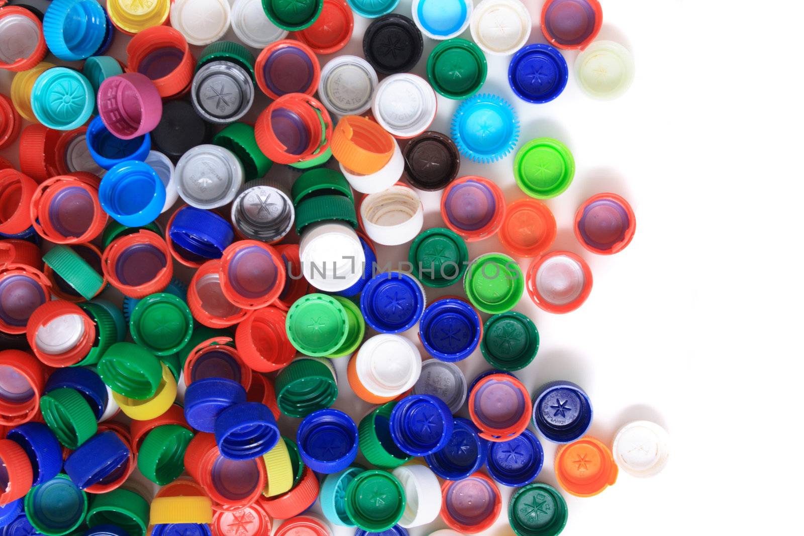rainbow background from different colors plastic caps 