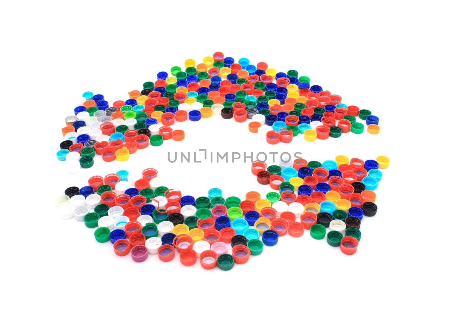 plastic caps as recycle symbol isolated on the white background