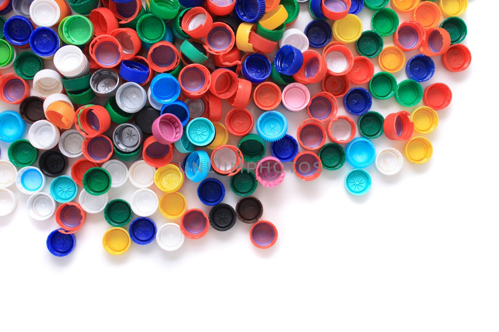 rainbow background from different colors plastic caps 