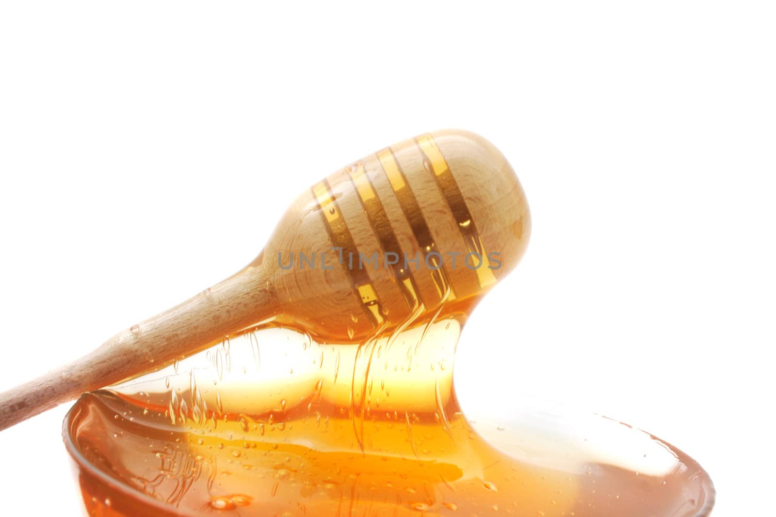 nice honey bacground with the wooden stick