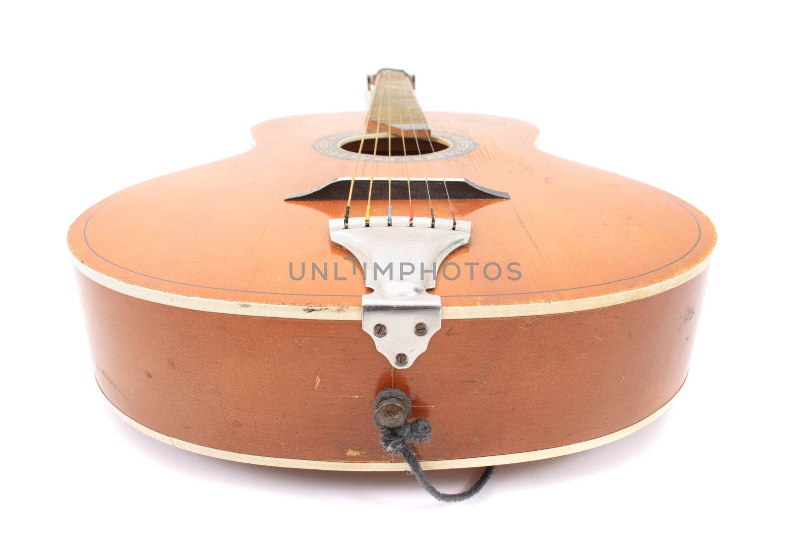 old guitar isolated on the white background