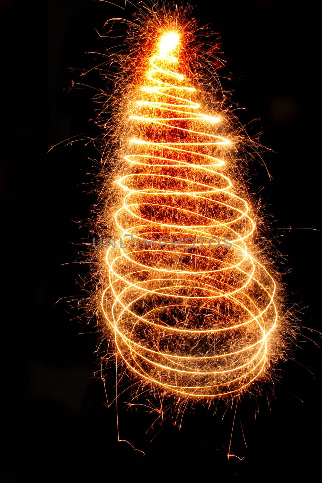 christmas tree from the sparklers in the dark night