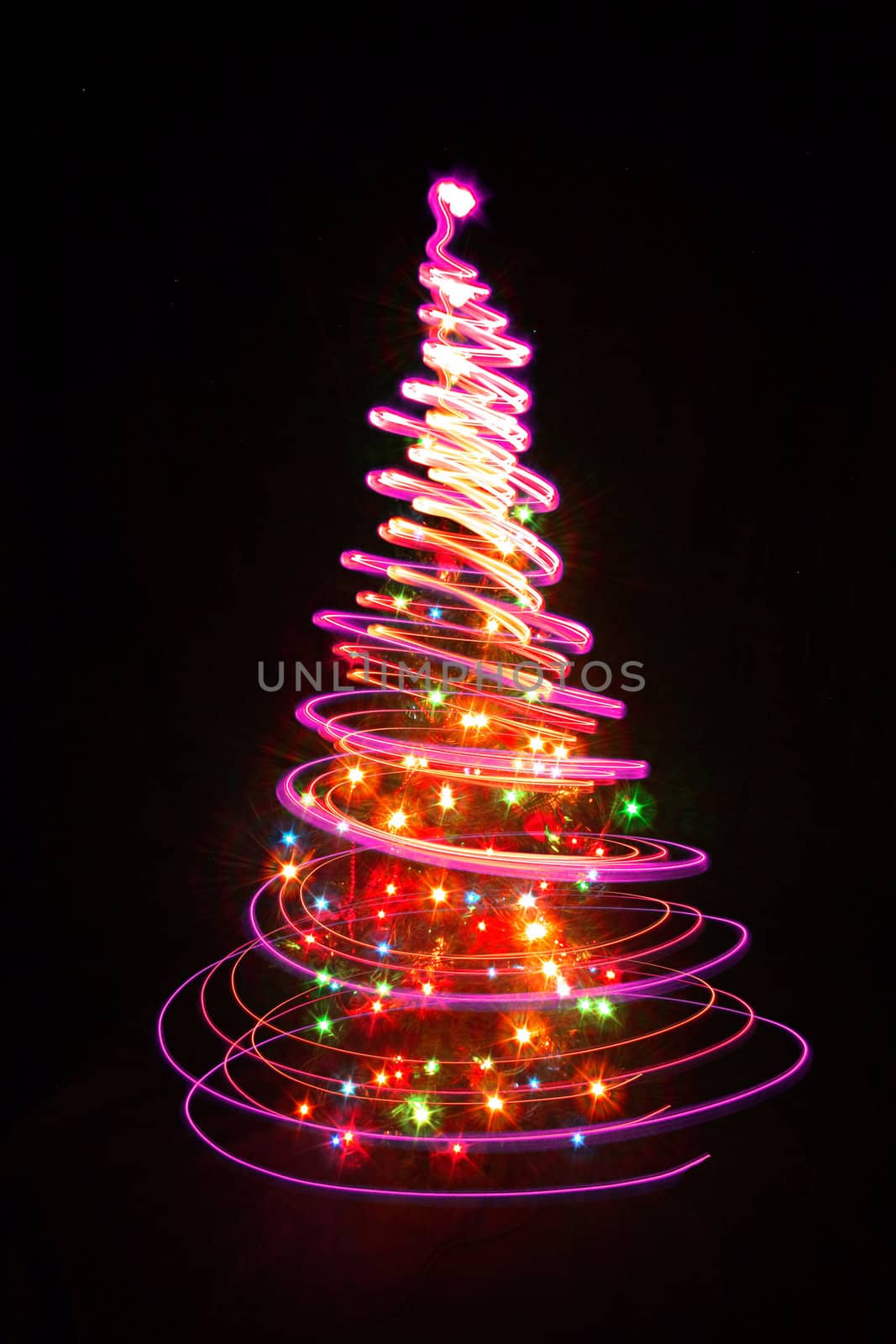 christmas tree form the color lights on the black background